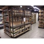 steel  frame  fixture  with  24  dispensers  and  waste  tray  made  for  galleries  lafayet  paris main outlet